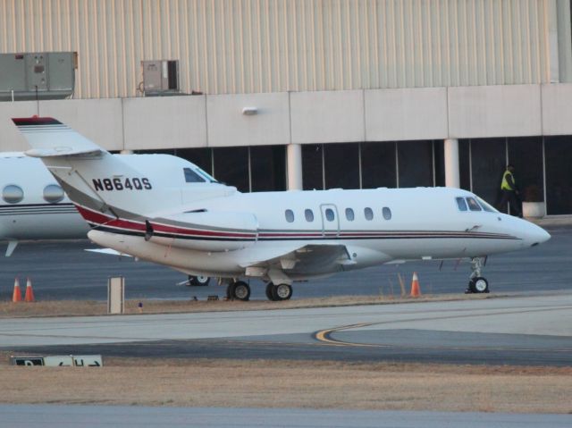 Hawker 800 (N864QS) - Parked at Signature ramp at PDK on 02/16/2011