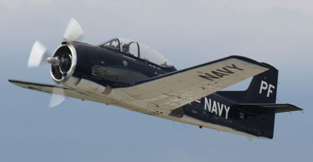 — — - On Bravo 2 taxiway getting a picture of T-28 taking off from Runway 20 at Gary Regional Airport.