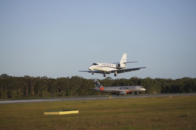 Cessna Citation Sovereign (VH-VPL) - VH-VPL about to land as Jetstar A320 prepares to depart