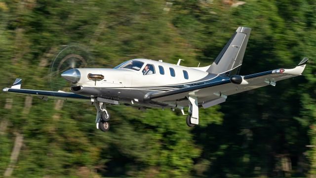 Daher-Socata TBM-900 (N900TW) - N900TW departing College Park Airport's runway 33 for a flight to St Simons Island