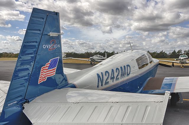 Mooney M-20 (N242MD) - Taken by Win W. while parked.