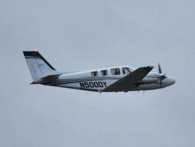 Beechcraft Baron (58) (N500DY) - YATES-CHREITZBERG-HUGHES ARCHITECTS PA departing runway 20 at KJQF - 6/8/13