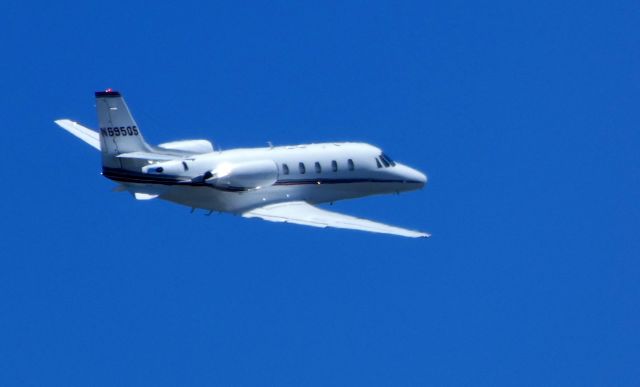 Cessna Citation Excel/XLS (N695QS) - Shown here departing is a Cessna Citation Excel/XLS in the Summer of 2018.