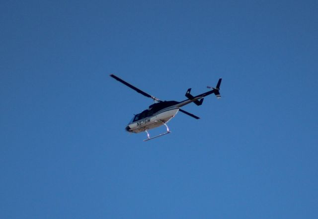 Bell JetRanger (N5751M) - 031714 Airmed Bell 206L eastbound over downtown Wichita