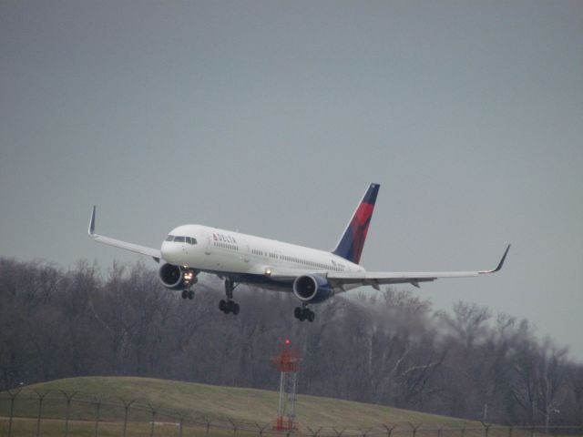 Boeing 757-200 (N551NW) - Moments before touchdown on runway 18L