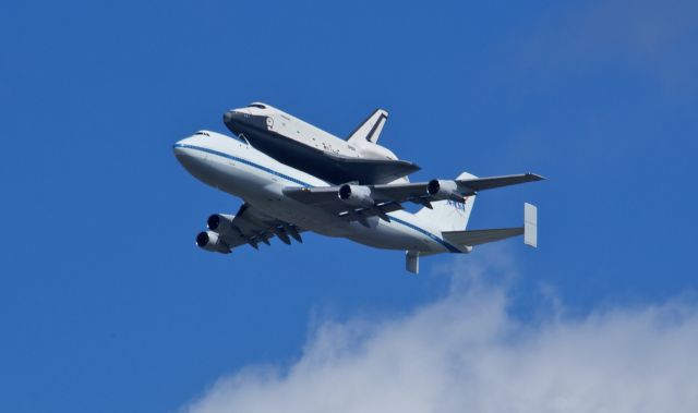 — — - Standing on the banks of the Hudson River and the Shuttle Enterprise arrived in NYC on the final mission enroute to its new home on the Intrepid aircraft carrier.