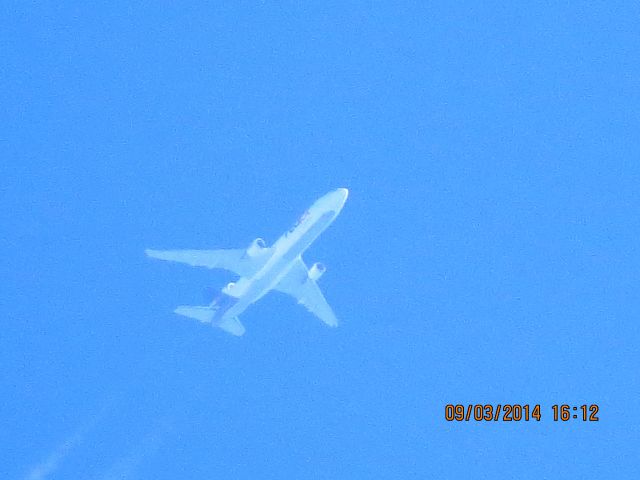 Boeing MD-11 (N620FE) - FedEx flight 781 from MEM to PDX over Baxter Springs KS (78KS) at 38k feet.