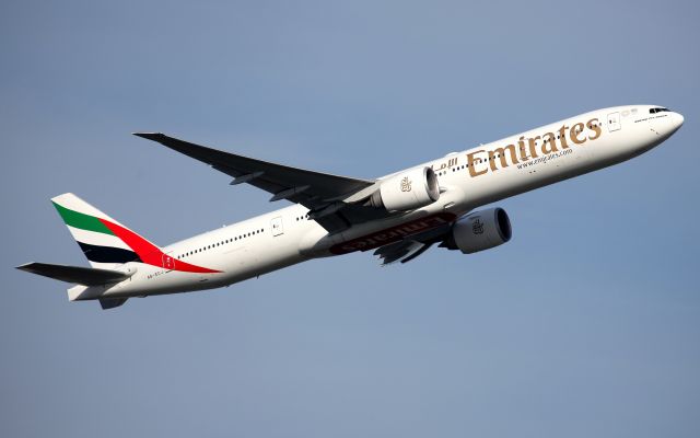 BOEING 777-300ER (A6-ECJ) - Climbing from Rwy 34L