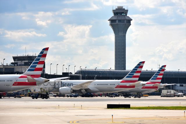 Boeing 787-8 (N817AN) - Line up of three AA 787s at ORD. N817AN, N809AA, N816AA