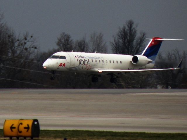 Canadair Regional Jet CRJ-200 (N920EV) - ACEY 4964 (N920EV) touching down at Blue Grass Airport (KLEX), in from Hartsfield-Jackson Intl (KATL). This CRJ sports the 100 CRJs and climbing for ASA! livery...