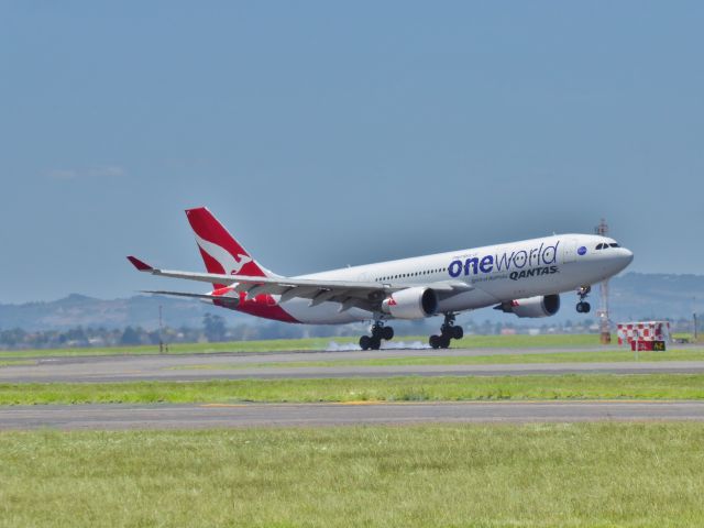 Airbus A330-200 (VH-EBV) - Touching down from Sydney as QF141