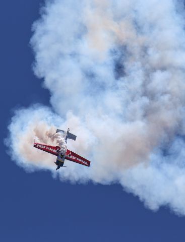 EXTRA EA-300 (N821MG) - A great stunt show at Sun N Fun. Questions about this photo can be sent to Info@FlewShots.com