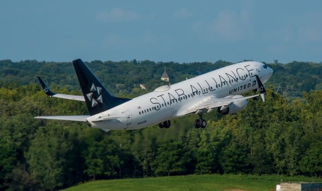 Boeing 737-800 (N26210) - United Star Alliance Livery departing on runway 10L, heading for Chicago