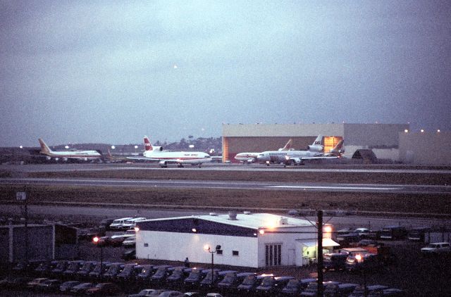 Lockheed L-1011 TriStar — - KLAX - Not my best photo - Imperial Hill action late PM photo of TWA L-1011 departing 7L.
