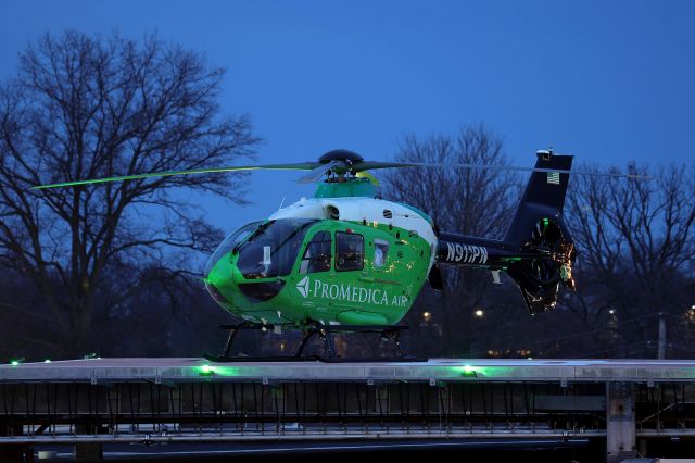 Eurocopter EC-635 (N911PN) - Seeing Promedica Air around Toledo is an everyday occurrence but it was a nice surprise to catch them at the Cleveland Clinic/Fairview Hospital this afternoon. Unfortunately for the crew, the aircraft experienced a mechanical issue and shutdown before liftoff as CLINIC1 circled above. The 5 ½ hr delay gave me the chance to catch the Airbus Helicopter H135 under the lights. They finally lifted off around 6PM tonight, 17 Dec 2021. 