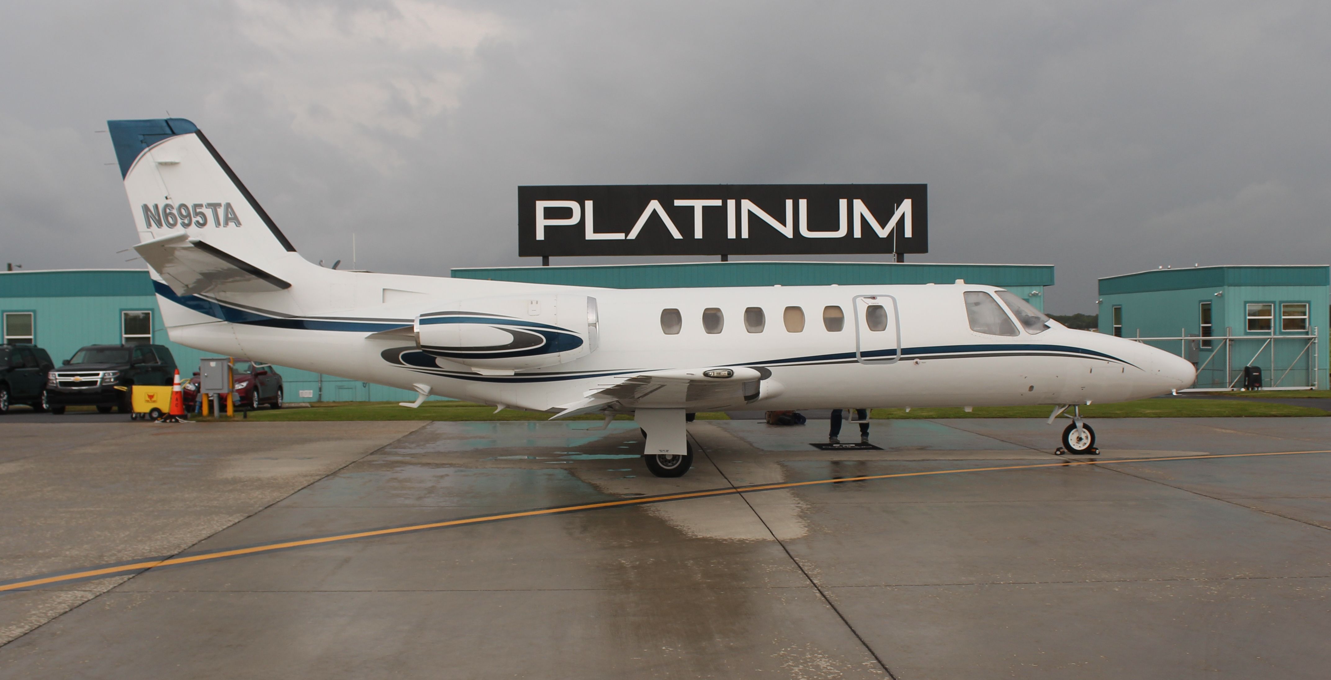 Cessna Citation II (N695TA) - A Cessna C550 Citation II in the rain on the Platinum Air Center ramp, Jack Edwards National Airport, Gulf Shores, AL - June 29, 2017. 