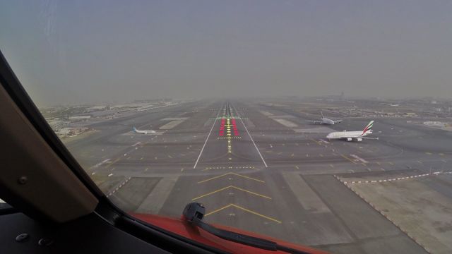 Boeing 777-200 (OO-THA) - On very short final at Dubai International! (Upcoming new film on the TNT Airways 777 Freigher to Dubal & Hong Kong)