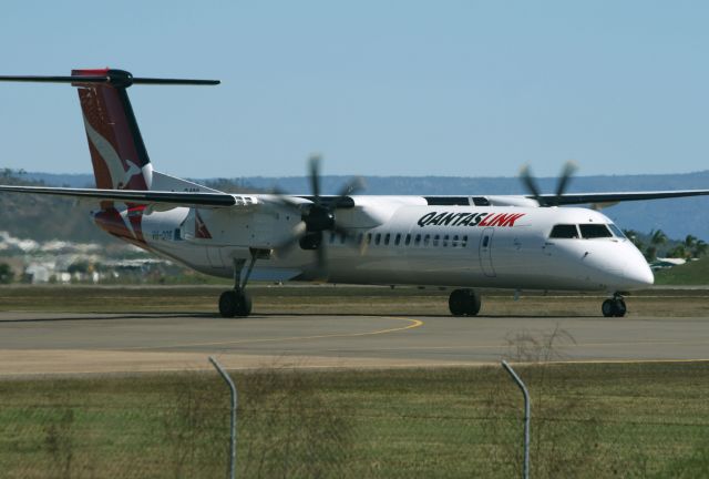 de Havilland Dash 8-400 (VH-QOS) - VH-QOS taxiing for departure runway 19 Townsville