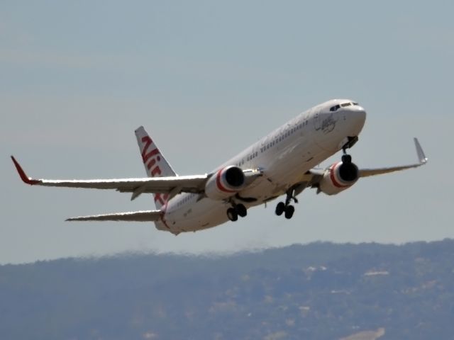 Boeing 737-800 (VH-YFF) - Getting airborne off runway 23. Wednesday 4th January 2012.