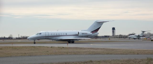 Cessna Citation Longitude (N802QS) - Taxiing to parking is this 2020 Cessna 700 Longitude in the Winter of 2023.