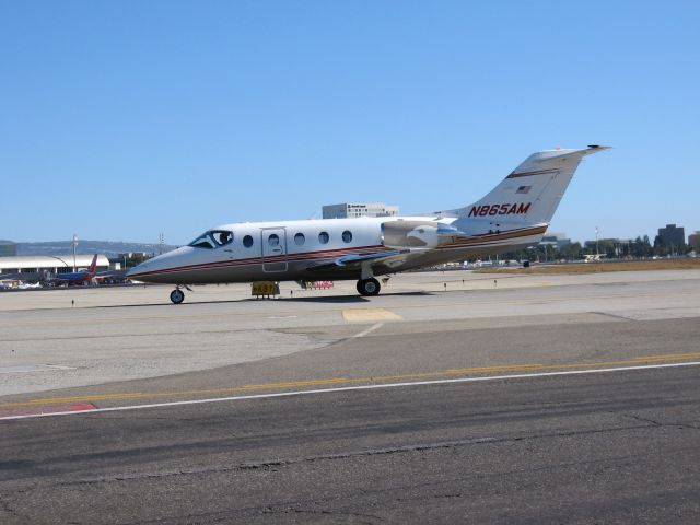 Beechcraft Beechjet (N865AM) - Holding short of RWY 19R