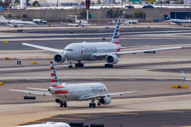 Boeing 777-200 (N779AN) - An American Airlines 777-200 taking off from PHX on 2/13/23, the busiest day in PHX history, during the Super Bowl rush. Taken with a Canon R7 and Canon EF 100-400 II L lens.