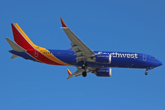 Boeing 737 MAX 8 (N8733M) - A new Max-8 for Southwest Airlines and the database. SWA1635 on a late afternoon approach for RWY 24R from Phoenix Sky Harbor Intl (KPHX) on 12 Mar 2019. N8733M was delivered on 14 Feb 2019.