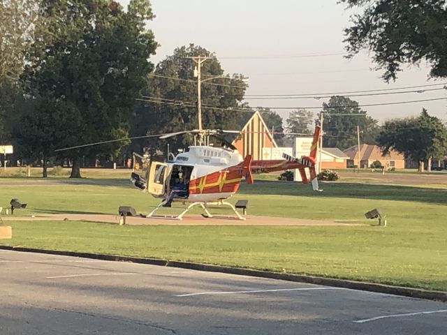 Bell 407 (N694PA) - Pafford Air One Alpha waiting at Bolivar Medical Center to pick up a patient 