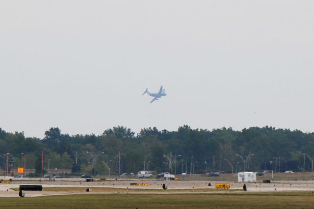 Boeing Globemaster III (90-0535) - TBird14, a C-17A, 90-0535, c/n P-535, from Wright-Patterson AFB, Dayton, OH, USA, still visible from KCLE in a steep bank for final approach to KBKL, downtown Cleveland minutes after departing KCLE on 31 Aug 2017. The C-17 brought support crews and equipment to KCLE for the 2017 Cleveland National Air Show.
