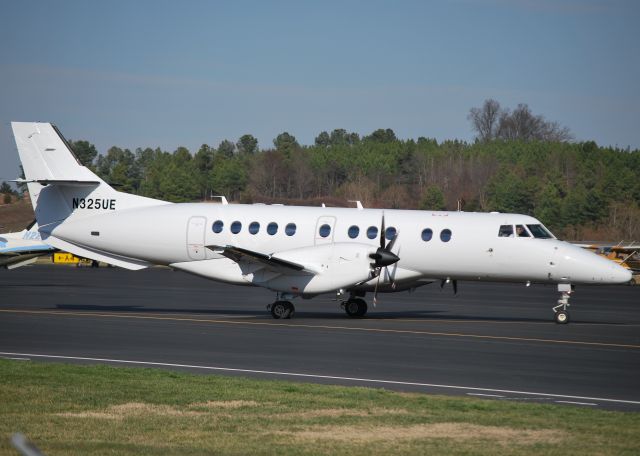 JETSTREAM Jetstream 41 (VTE325) - CORPORATE FLIGHT MANAGEMENT "Volunteer" (N325UE) taxiing out at KJQF with the UNC-Charlotte 49ers mens basketball team headed for PHL to play Temple Feb. 6 - 2/5/13