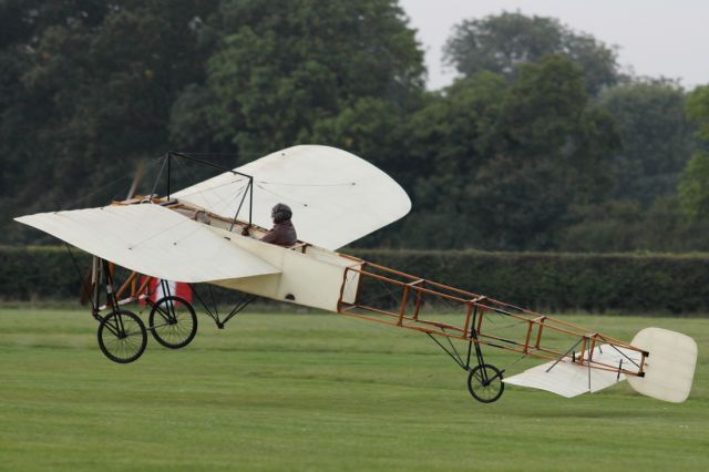 — — - A very fragile aircraft touches down at Old Warden. This example of the Bleriot XI is today the worlds oldest airworthy aeroplane still flying, having been built in 1910. Hard to imagine this same make of aircraft made the first aerial crossing of the English Channel, piloted by it's creator Loius Bleriot.