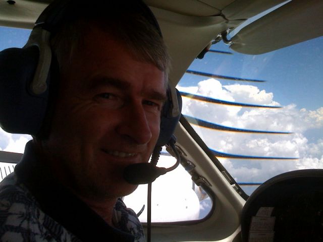 Cessna 421 (N540CC) - Cruising over the weather at FL190 somewhere near Ocala Florida.