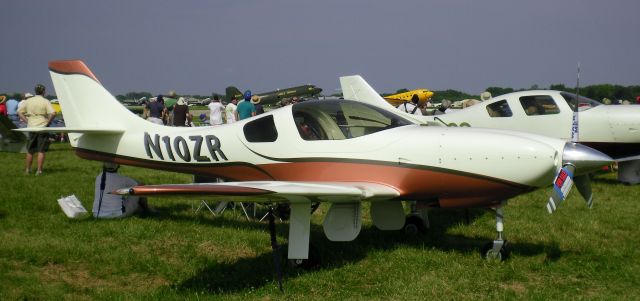 Lancair Legacy 2000 (N10ZR) - Lancair Legacy N10ZR on display at Oshkosh 2010 with a For Sale" sign on it.