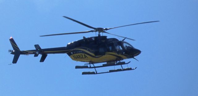 Bell 407 (N48ZA) - Making a low pass is this 2010 Bell 407 rotorcraft in the Spring of 2025.