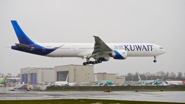 BOEING 777-300 (9K-AOD) - BOE458 on final to Rwy 16R tp complete a B1 flight on 12.10.16. (ln 1458 / cn 62562). It was a miserable day for spotting with a very cold rain falling and low visibility.