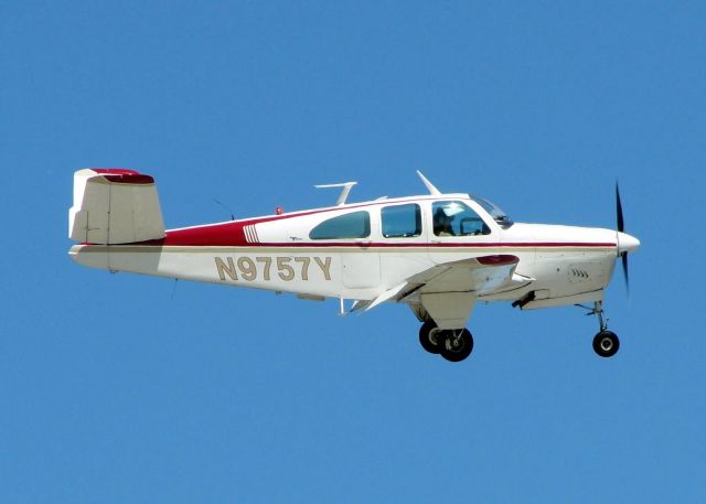 Beechcraft 35 Bonanza (N9757Y) - 1963 Beech P35 landing at Shreveport's Downtown Airport.