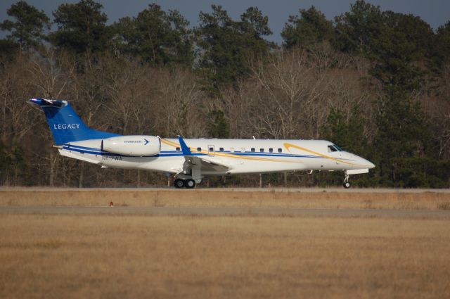 Embraer ERJ-135 (N617WA) - Rolling down 14 at Lone Star.