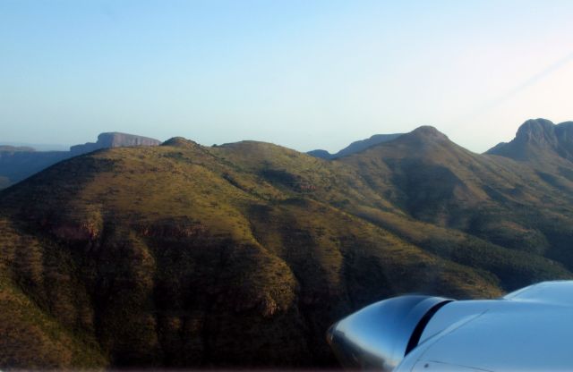 Beechcraft Baron (58) (ZS-MDJ) - En route to Maritaba, South Africa.