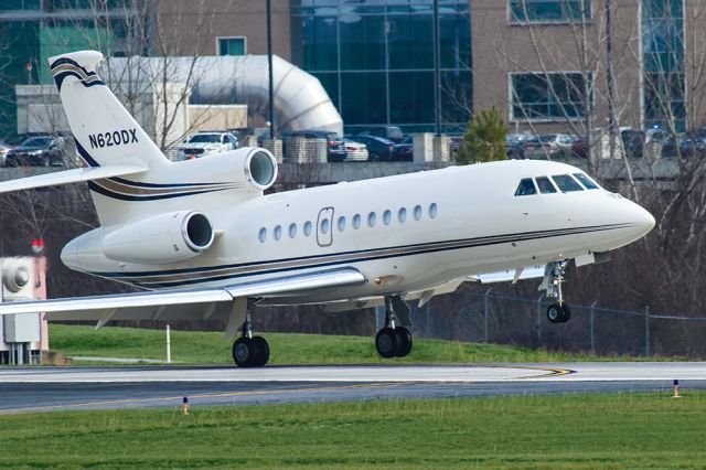 Dassault Falcon 900 (N620DX) - Falcon 900EX landing a little off kilter. Questions about this photo can be sent to Info@FlewShots.com