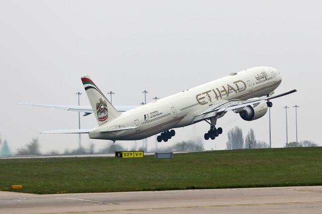 BOEING 777-300ER (A6-ETQ) - Not yet painted into the new scheme.  ETD16 departs on the 7hr flight back to Abu Dhabi.