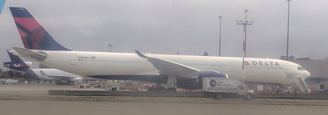 Airbus A330-900 (N402DX) - Taxiing at SEATAC.