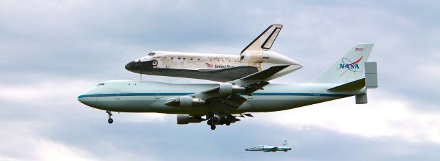 BOEING 747-100 (N905NA) - Dulles International Airport on April 17, 2012.  The last flight of the Space Shuttle Discovery seen here as it passed the Udvar Hazy Air & Space Museum about 10:30a.m.  It was very impressive.  I'm glad I fought the Washington traffic both ways to be there and capture this event.