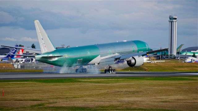 BOEING 777-300 (B-2001) - BOE451 lands on Rwy 16R to complete its first flight test on 8/13/14. (LN:1232 / cn 43269). This is the first B777 for China Eastern.