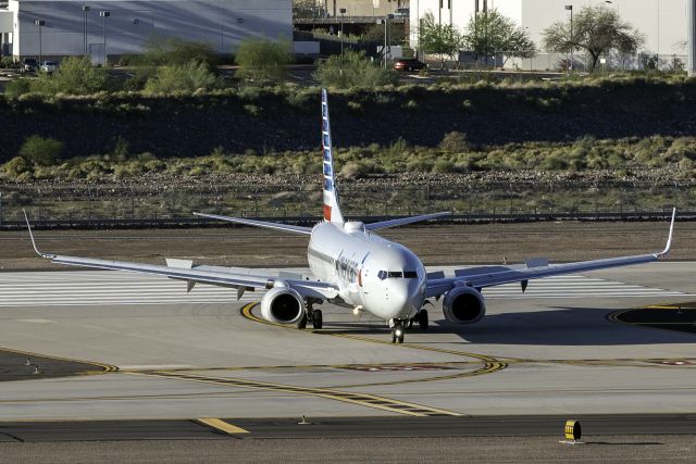 Boeing 737-800 — - Turning off of 7L. 