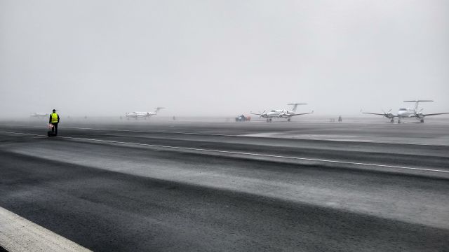 Beechcraft Super King Air 350 (VH-FIZ) - Waiting for the fog to lift