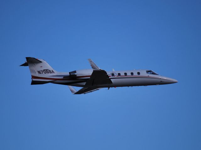 Learjet 31 (N706SA) - Departing runway 20 at KJQF - 3/4/09