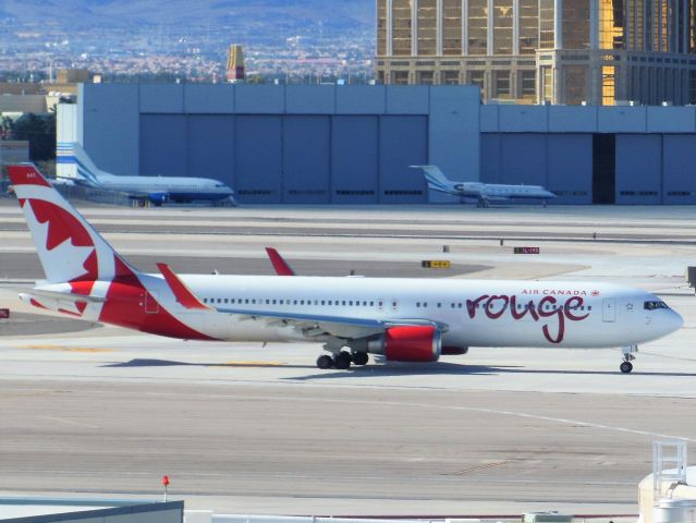 BOEING 767-300 (C-GHLV) - Air Canada Rouge (RV) C-GHLV B767-333 ER [cn30852]br /Las Vegas (LAS). Air Canada Rouge flight RV1833 departing for Vancouver (YVR). br /Taken from Staff Car Park Level 6 (above Terminal 1)br /2016 02 18     a rel=nofollow href=http://alphayankee.smugmug.com/Airlines-and-Airliners-Portfolio/Airlines/AmericasAirlines/Air-Canada-Rouge-RV/i-5JvNfg4https://alphayankee.smugmug.com/Airlines-and-Airliners-Portfolio/Airlines/AmericasAirlines/Air-Canada-Rouge-RV/i-5JvNfg4/a