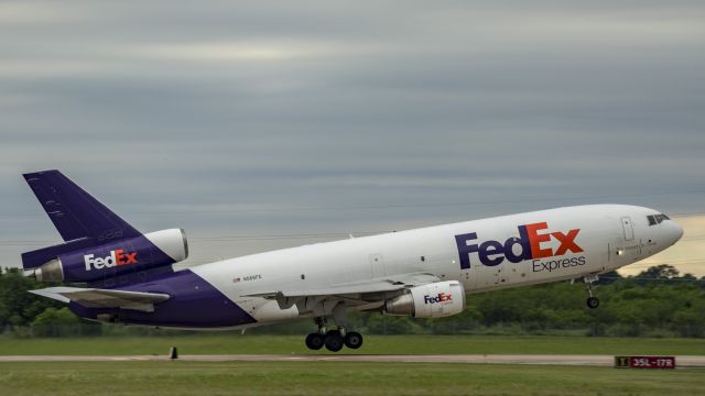 McDonnell Douglas DC-10 (N566FE) - Departing 35L
