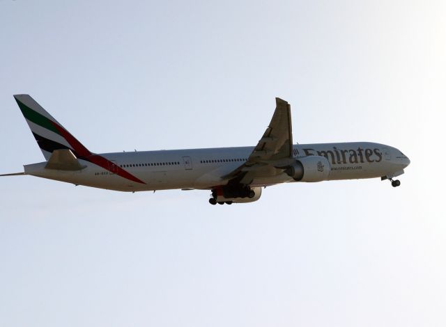 BOEING 777-300 (A6-ECU) - Sept 2010 photo of the late PM departure for Abu Dhabi. We see this jet quite often at SFO.