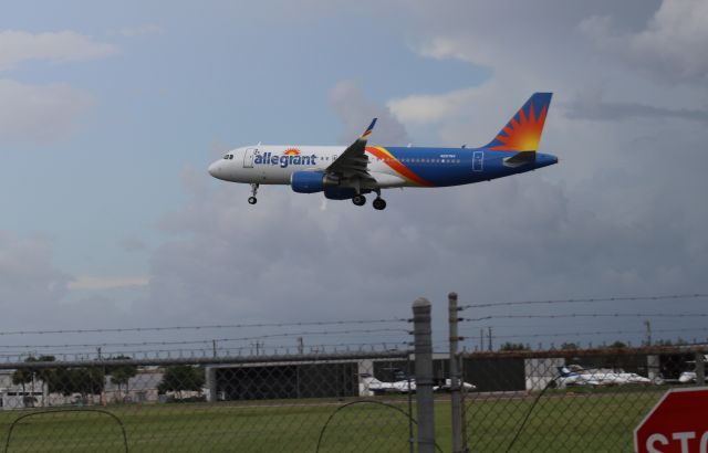 Airbus A320 (N257NV) - 7/23/22 over the threshold at Sanford